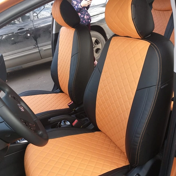 Чехлы на передние сиденья Hyundai из черной и оранжевой экокожи с прострочкой «ромб»